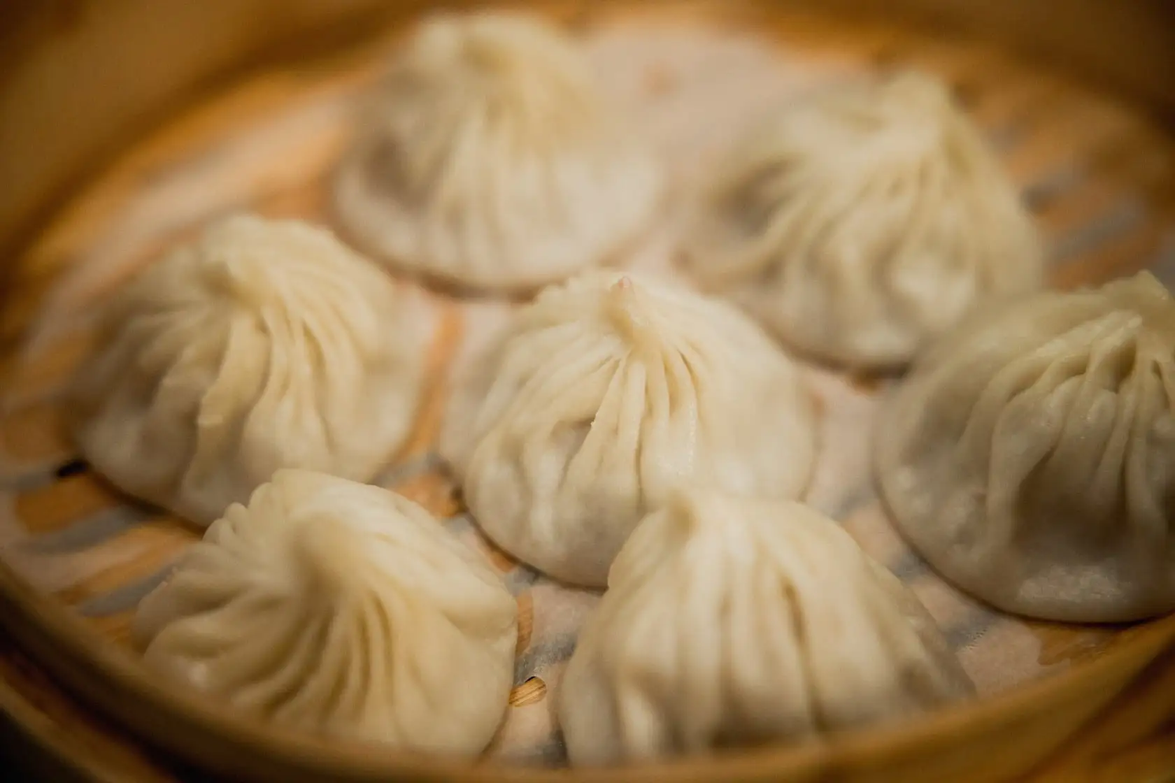 soup dumplings in steamer basket