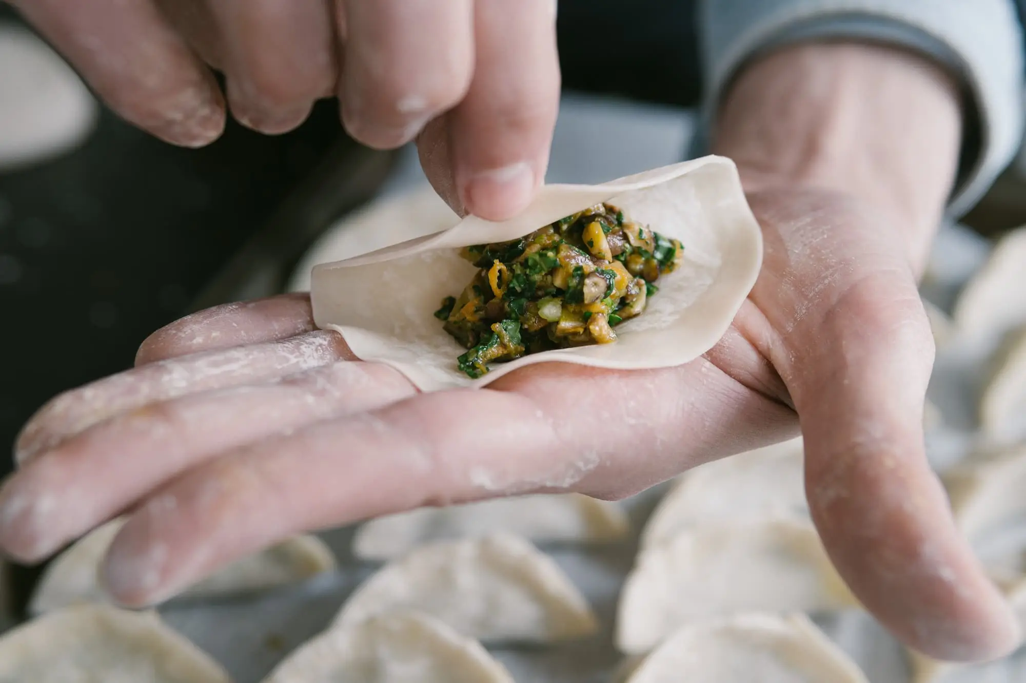 folding dumplings